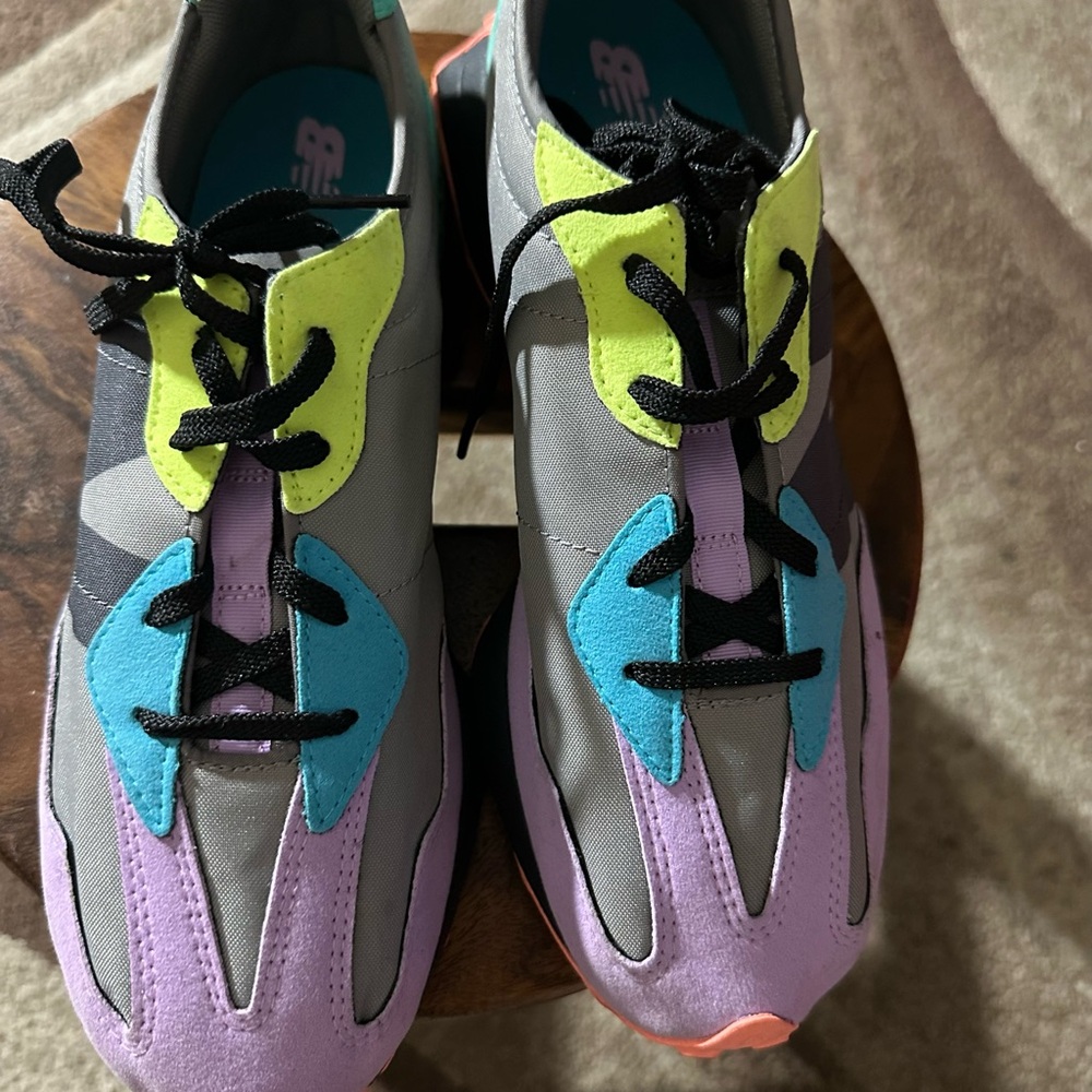 New Balance Gray Sneakers with Yellow and Blue Accents